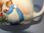 Royal Doulton Bunnykins mug featuring family breakfast scene by Barbara Vernon