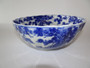 19th century blue and white Japanese scalloped bowl, designed with pine trees.