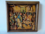 Rare original Arni woodcarving titled The Peasant Wedding Feast intricately carved with muted colour tones in original frame.
