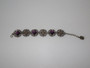 Vintage Paris panel link bracelet with purple cabochons.