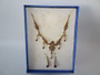 Vintage Bess gold-toned necklace and matching earrings with simulated gemstones in original presentation box.