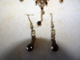 Vintage Bess gold-toned necklace and matching earrings with simulated gemstones in original presentation box.