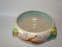 Clarice Cliff bowl depicting beautiful colourways and budgies circa 1930s.