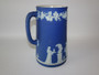 19th century Wedgwood jasperware dark blue pitcher with some age related wear mainly to inside.