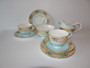 Rare Aynsley tea for two 8 piece tea set decorated with floral design and gold chintz dated 1934-1950.