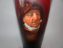 Rare German Geubruder Heubach painted portrait vase depicting a sailor with cap and pipe dated betweeen 1882-1915.