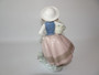 LLadro Sweet Scent Porcelain Figurine - Girl with Basket of Flowers