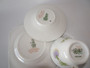 Royal Doulton Glamis Thistle trio signed by P. Curnock with thistle design – teacup, saucer, and square plate