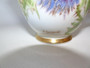 Royal Doulton Glamis Thistle trio signed by P. Curnock with thistle design – teacup, saucer, and square plate