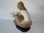 Lladro 3526 Watching the Dove porcelain figurine with wooden base, designed by Juan Huerta, issued 1982, retired 2019, measures 35 cm x 30 cm