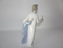 Lladro 4874 Boy in Nightshirt figurine by Francisco Catalá, porcelain collectible with candle and child