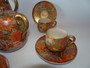Japanese Meiji Satsuma 15-piece tea set by Hayakawa with millefleur pattern and gilded decoration