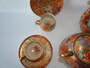 Japanese Meiji Satsuma 15-piece tea set by Hayakawa with millefleur pattern and gilded decoration