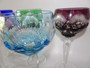 Vintage set of six harlequin crystal hock glasses in assorted colours, 21cm tall, hand-cut European crystal on white background