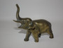 Early 20th century bronze or brass elephant sculpture with raised trunk, 10cm x 9cm