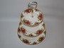 Royal Albert Old Country Roses three tier cake stand with gold-tone handle measuring 35 cm tall.