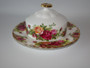 Royal Albert Old Country Roses lidded butter dish with plate measuring 16 cm and lid 10 x 6 cm.