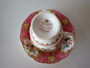 Royal Albert Lady Carlyle pink floral teacup and saucer with gold trim dated 2003