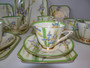 Royal Doulton Art Deco Iris 21-piece tea set with green border and floral design