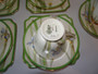 Royal Doulton Art Deco Iris 21-piece tea set with green border and floral design