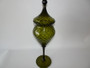 1960s Empoli olive green optic glass apothecary jar with tall stem and circus tent lid