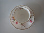 Royal Crown Derby Derby Posies demitasse cup and saucer with floral decoration and gilt trim