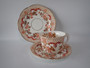 Antique Coalport attributed bone china trio with Imari-inspired red and gilt decoration, circa 1890.