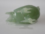 Chinese carved green hardstone rooster with finely detailed plumage and softly translucent finish, circa 1950–1970.