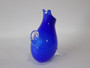 Signed Tegan Empson Australian hand-blown blue studio art glass Critter jug with clear glass legs and handle, circa 1990s.