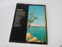 Set of four vintage Tintin Magnet Edition books by Hergé featuring Lake of Sharks, Land of Black Gold, The Castafiore Emerald and The Shooting Star.