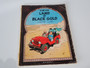 Set of four vintage Tintin Magnet Edition books by Hergé featuring Lake of Sharks, Land of Black Gold, The Castafiore Emerald and The Shooting Star.