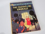 Set of four vintage Tintin Magnet Edition books by Hergé featuring Lake of Sharks, Land of Black Gold, The Castafiore Emerald and The Shooting Star.