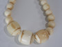Vintage Art Deco graduated bovine bone necklace with polished natural bone beads, barrel-shaped centre beads and screw clasp, dating from the 1930s–1950s.
