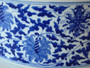 Vintage Chinese blue and white porcelain brush basin hand painted with scrolling lotus flowers and foliage.