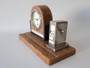 Art Deco marble desk clock with matching chrome-tone perpetual calendar on rectangular marble base, circa 1920s–1930s.