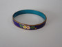 Vintage Chinese cloisonné enamel bangle with floral decoration on a russet-red ground and turquoise-blue enamel interior.