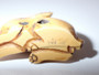 19th-century Japanese ivory rabbit netsuke with folded ears, rich honey patina and historical handling wear.