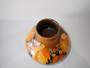 1928 William Moorcroft signed salt glaze Leaf and Berries vase in autumnal ochre, amber and brown tones.