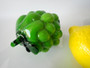 Vintage Murano style art glass fruit collection with colourful glass grapes, lemon, pear, avocado and green fruiting branch.