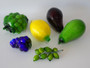 Vintage Murano style art glass fruit collection with colourful glass grapes, lemon, pear, avocado and green fruiting branch.