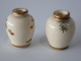Pair of antique Japanese Shinzan Kamiyama miniature Satsuma vases with maple and bamboo decoration and gilt rims.