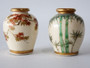 Pair of antique Japanese Shinzan Kamiyama miniature Satsuma vases with maple and bamboo decoration and gilt rims.