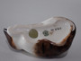 Royal Doulton HN2581 Sleeping Kitten porcelain figurine in brown and cream, measuring 8.5 cm long.