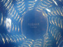 Signed R. Lalique Ondes opalescent glass plate designed in 1935 with radiating Art Deco wave pattern.