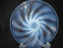Signed R. Lalique Ondes opalescent glass plate designed in 1935 with radiating Art Deco wave pattern.