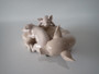 Lladró Playful Piglets 5228 glossy porcelain figurine depicting a mother pig with two playful piglets, sculpted by José Roig.