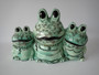 Vintage Arnel's ceramic frog family planter with three smiling mint-green frogs, hand-glazed by Judy Story and dated March 1986, 26cm wide.