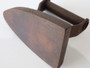 Antique George Salter & Co Sylvester Patent cast-iron sad iron with fixed metal handle, surface rust and age-related pitting.