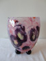 Signed Charles Schneider Art Deco jade glass vase circa 1920s with mottled pink and plum tones on sculptural black feet