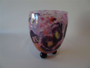 Signed Charles Schneider Art Deco jade glass vase circa 1920s with mottled pink and plum tones on sculptural black feet